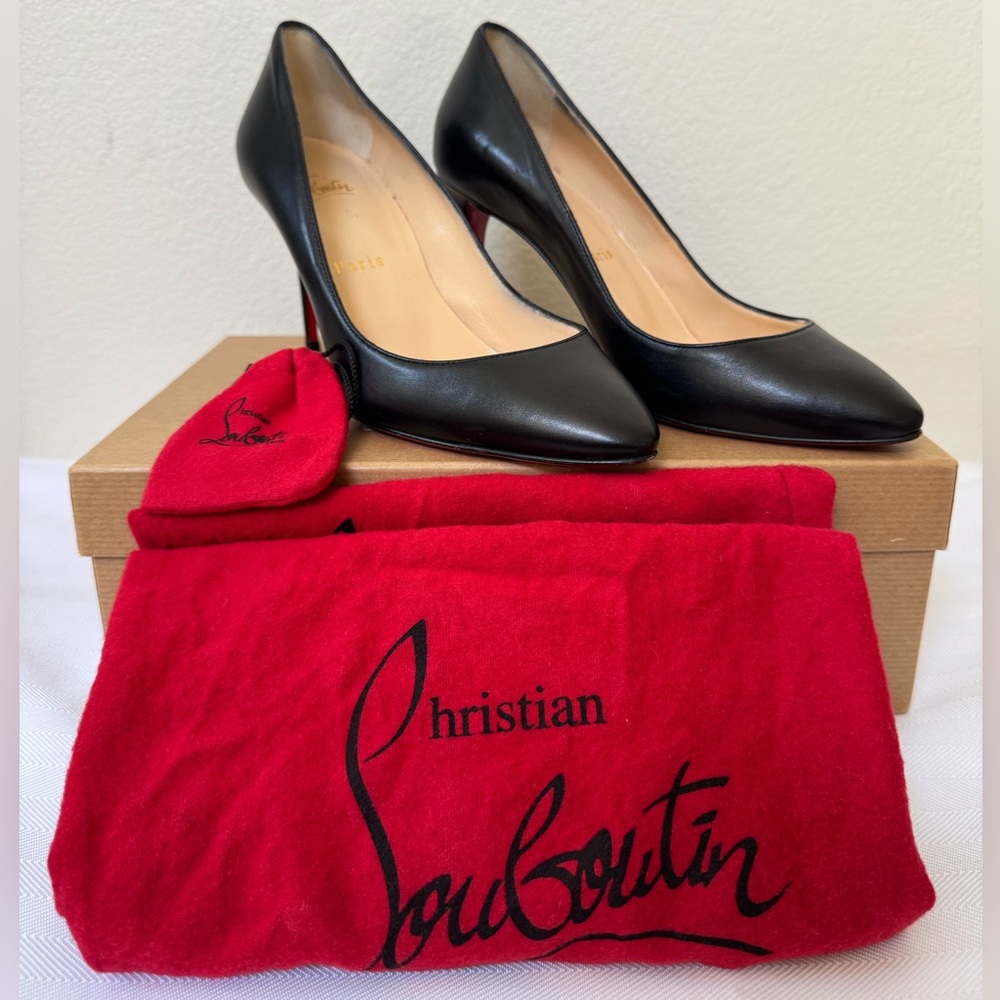 Christian Louboutin Black Heels with Stiletto Design and Pointed Toe